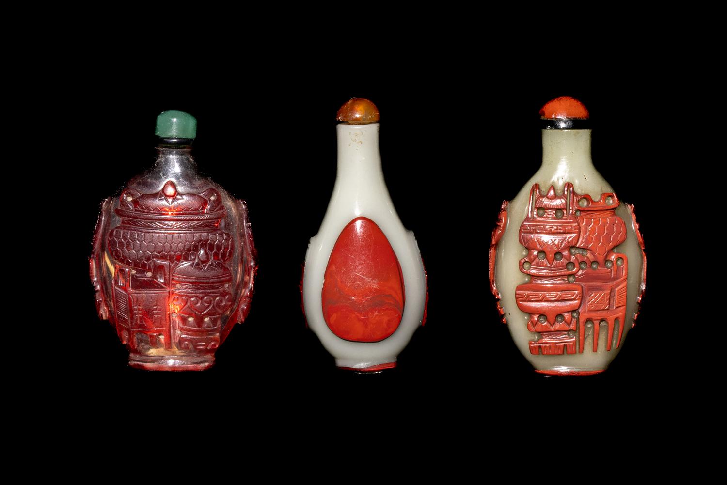 Three Chinese Red Overlay Glass Snuff Bottles