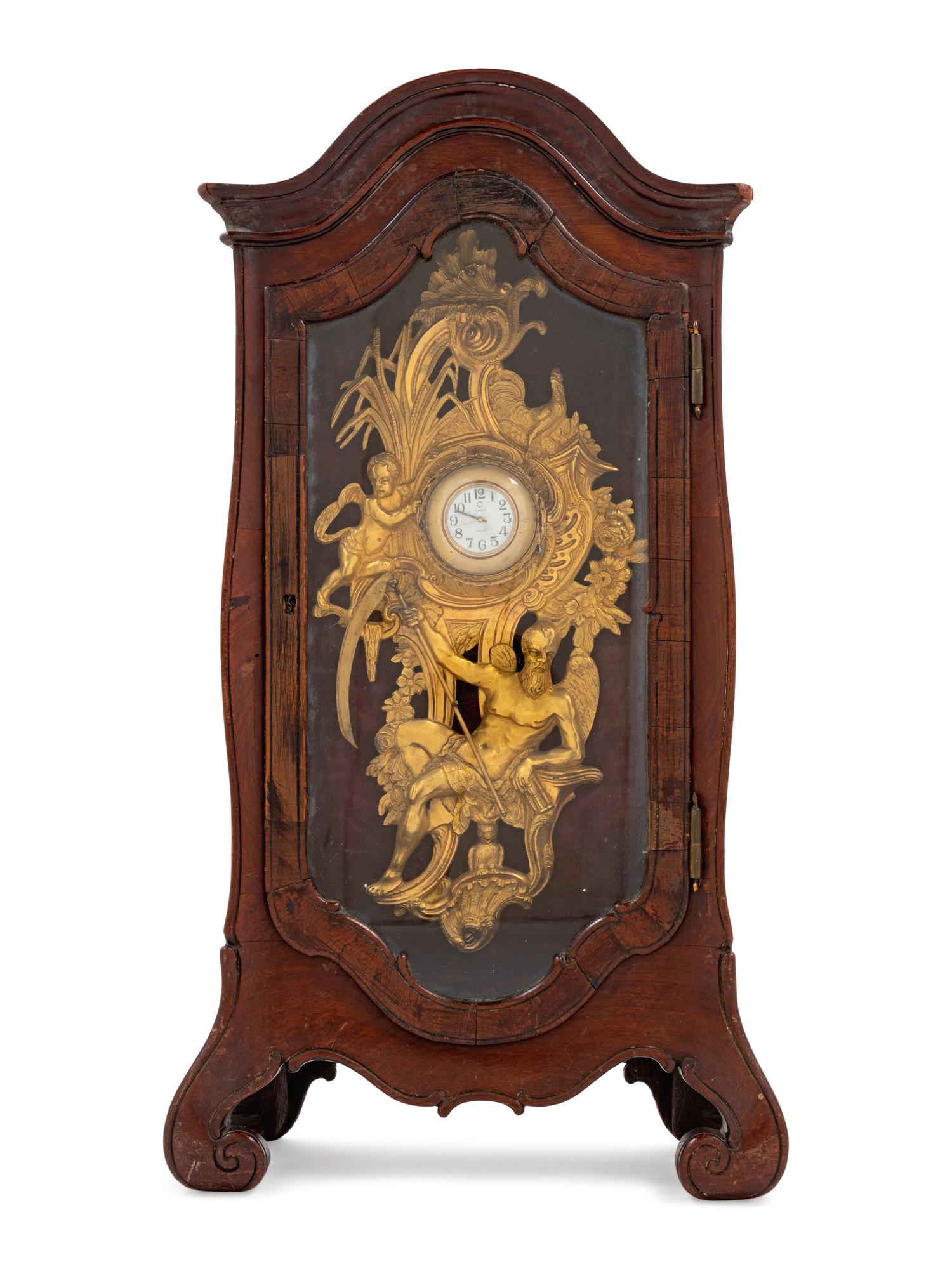 A Continental Walnut Clock Case