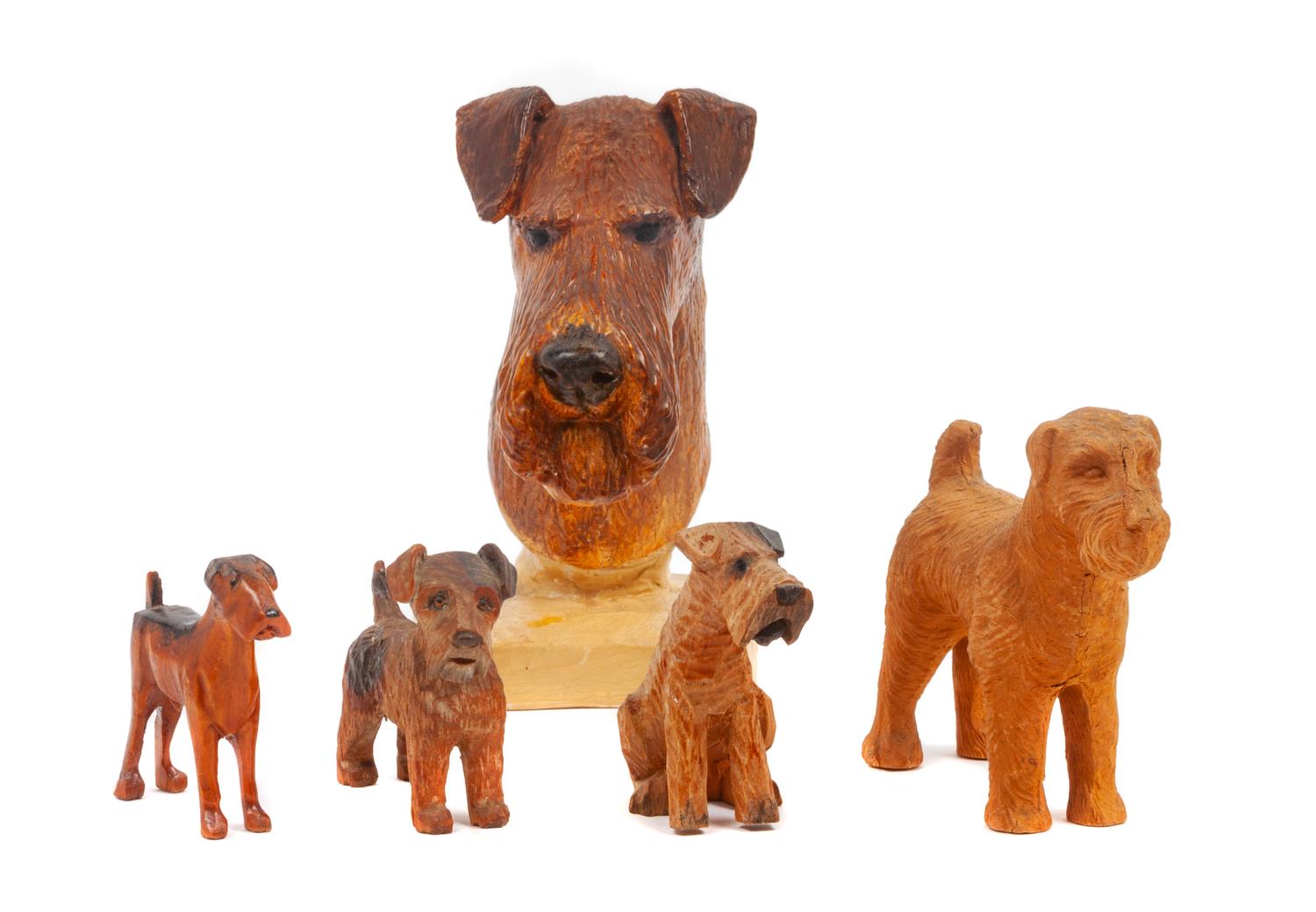 A Group of Five Airedale Terrier Figures Height of tallest 5 3/4 inches.