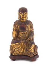 A Gilt Lacquered Wood Figure of Buddha — LIKELY MING DYNASTY