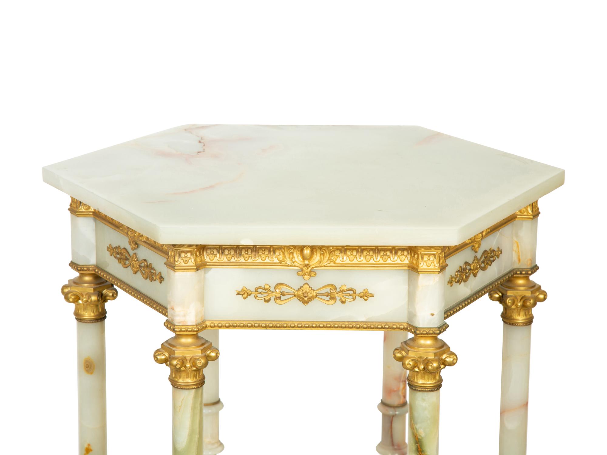 A Continental Gilt Bronze and Onyx Side Table