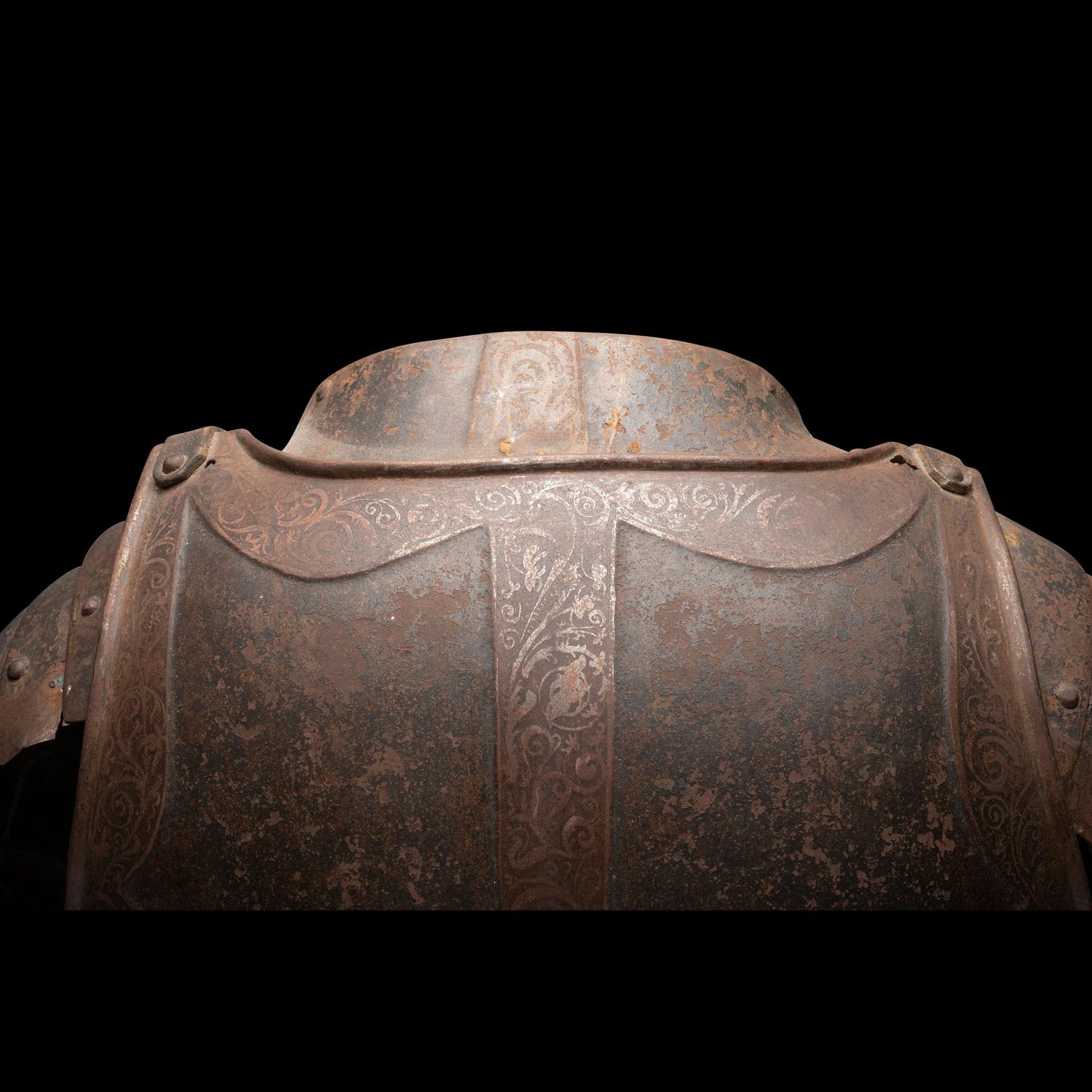 A 17th Century German Etched and Painted Half Suit of Armor
