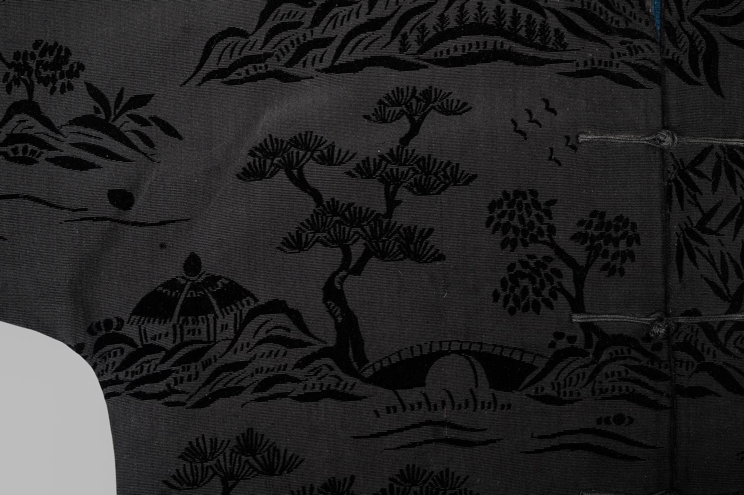 A Chinese Black Ground Silk Twill and Cut Velvet Jacket