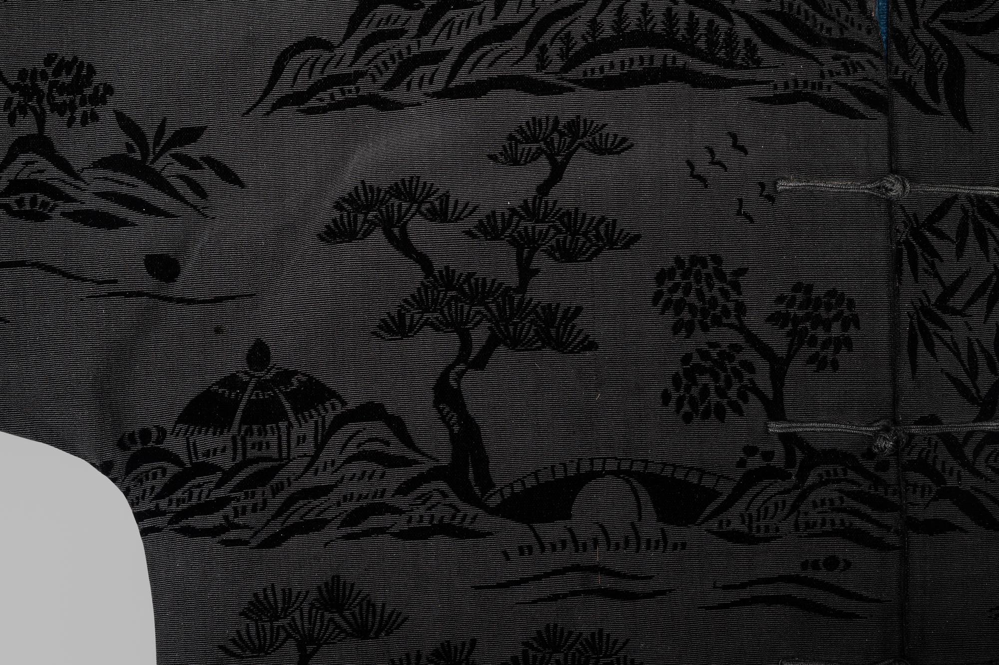 A Chinese Black Ground Silk Twill and Cut Velvet Jacket