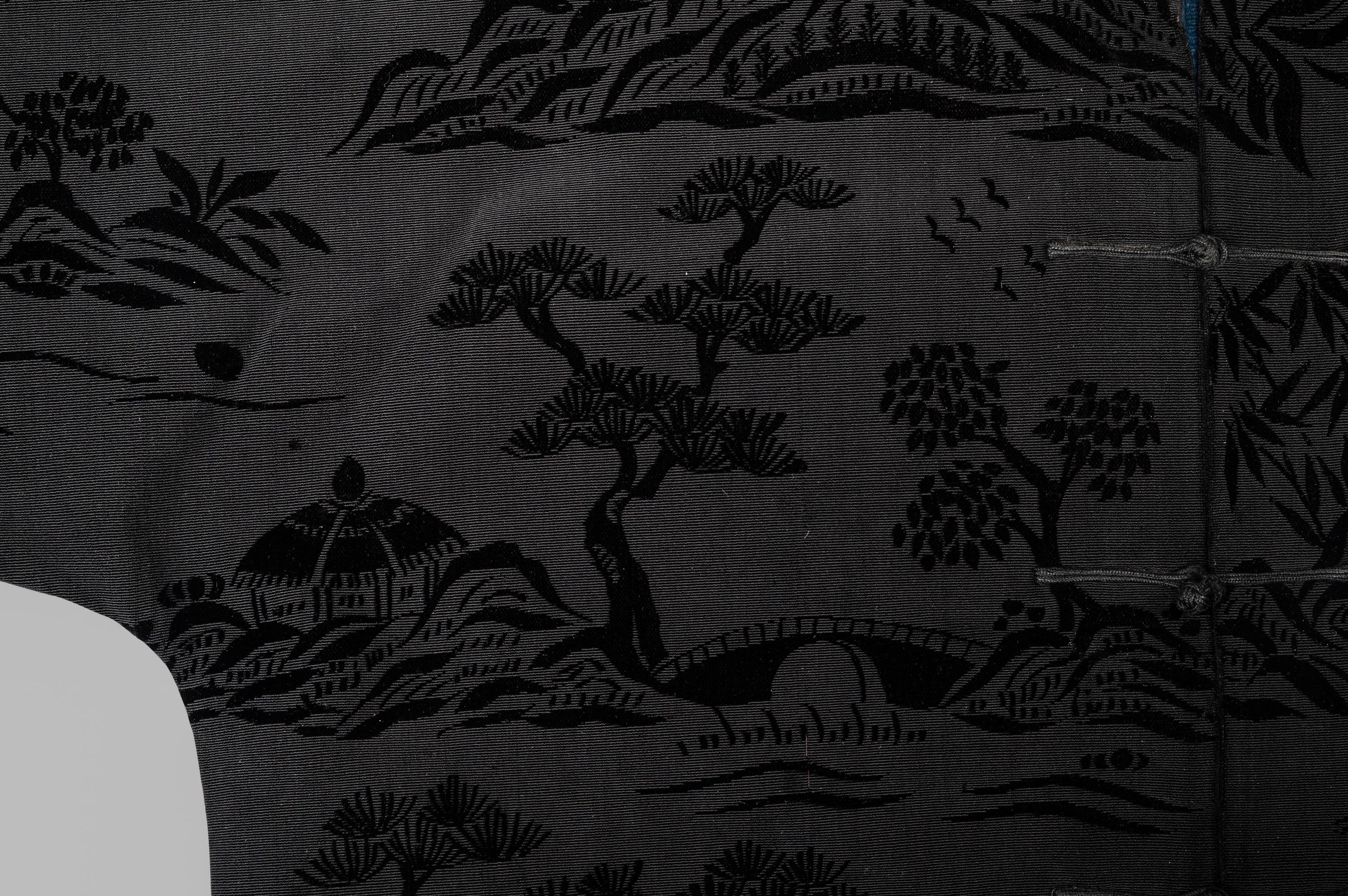 A Chinese Black Ground Silk Twill and Cut Velvet Jacket