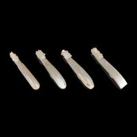 Four Chinese Greyish White Jade "Dragon" Head Belt Hooks, Qing Dynasty — 清 灰白玉龍鉤四件