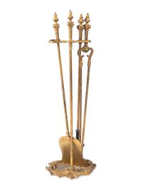 A Set of Louis XV Style Gilt Bronze Fire Tools