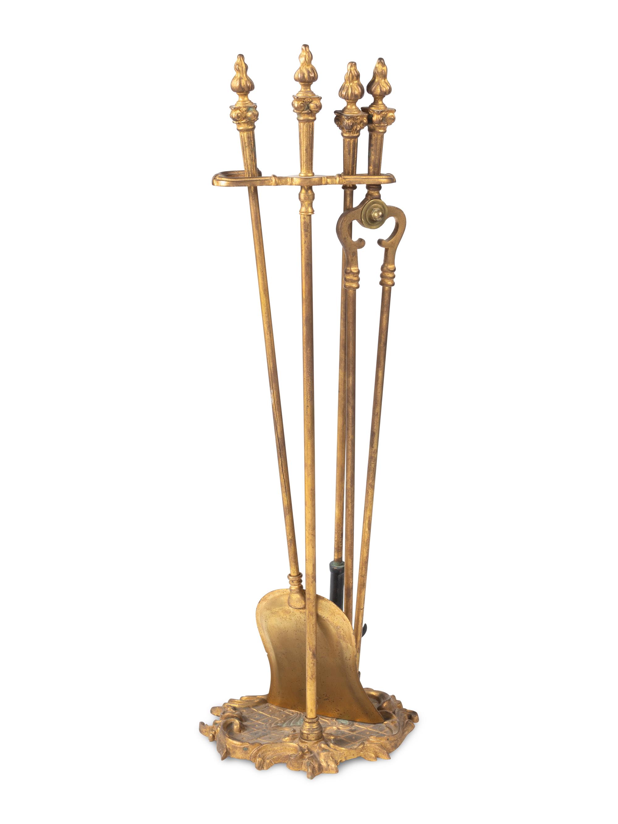 A Set of Louis XV Style Gilt Bronze Fire Tools
