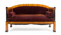 A Biedermeier Parcel Ebonized Birch Sofa Height 39 x width 67 inches. — MANNER OF JOSEF DANHAUSER, MID-19TH CENTURY
