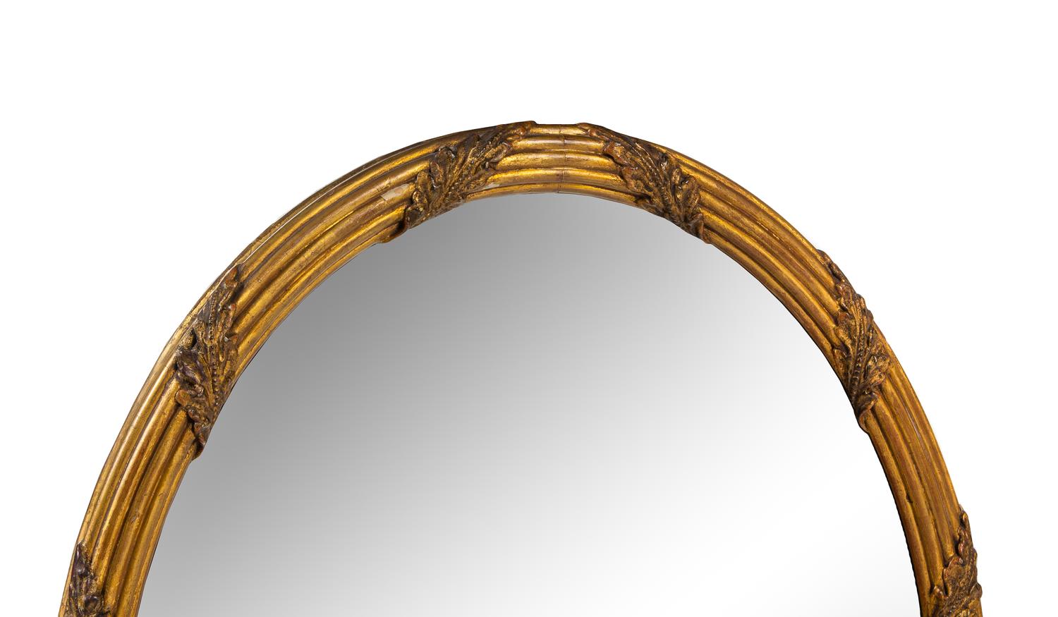 A Louis XVI Style Giltwood Oval Mirror