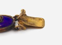 A Gold, Enamel, and Diamond Locket Necklace