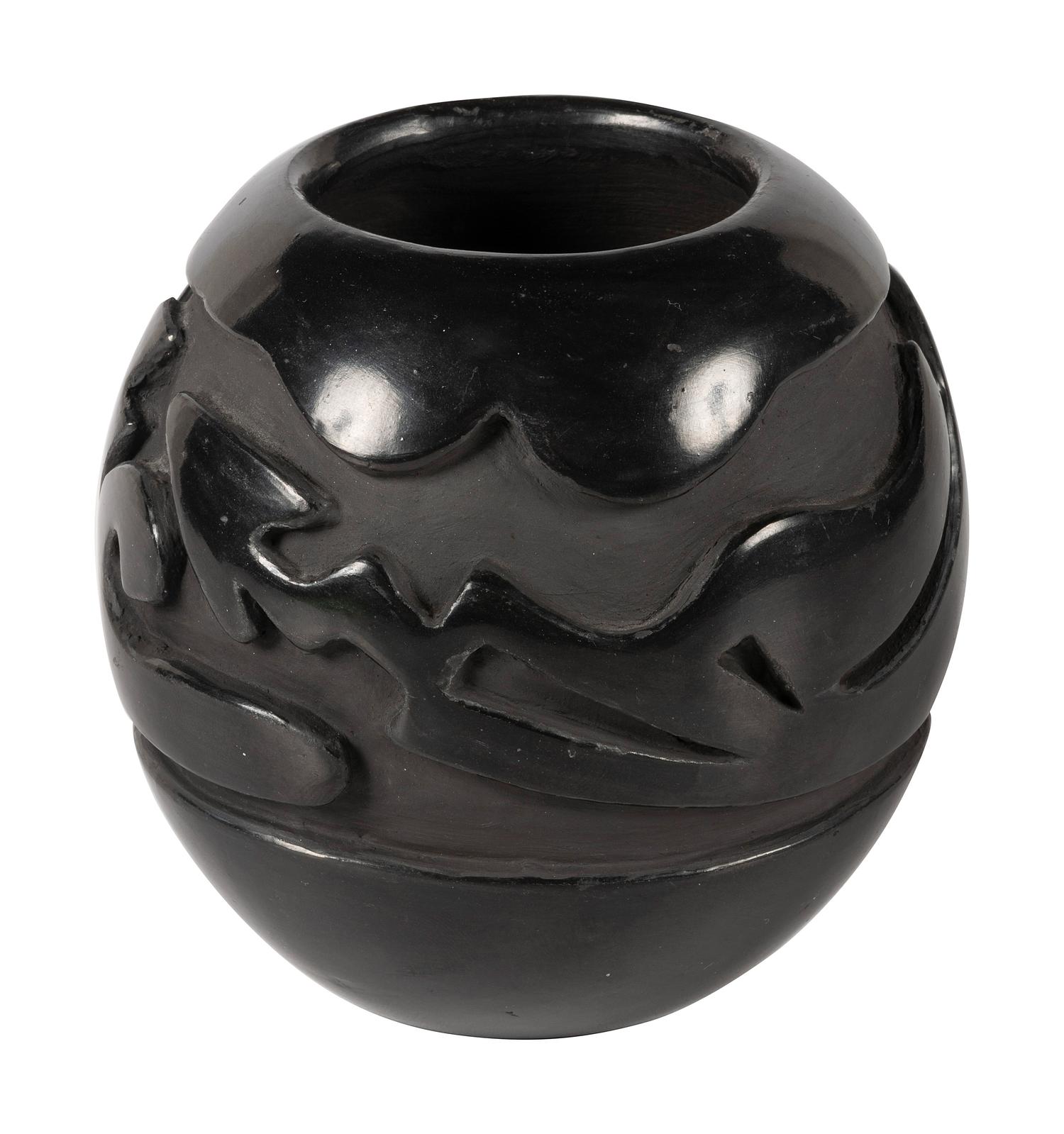 Deeply Carved Blackware Pottery Jar, with Avanyu