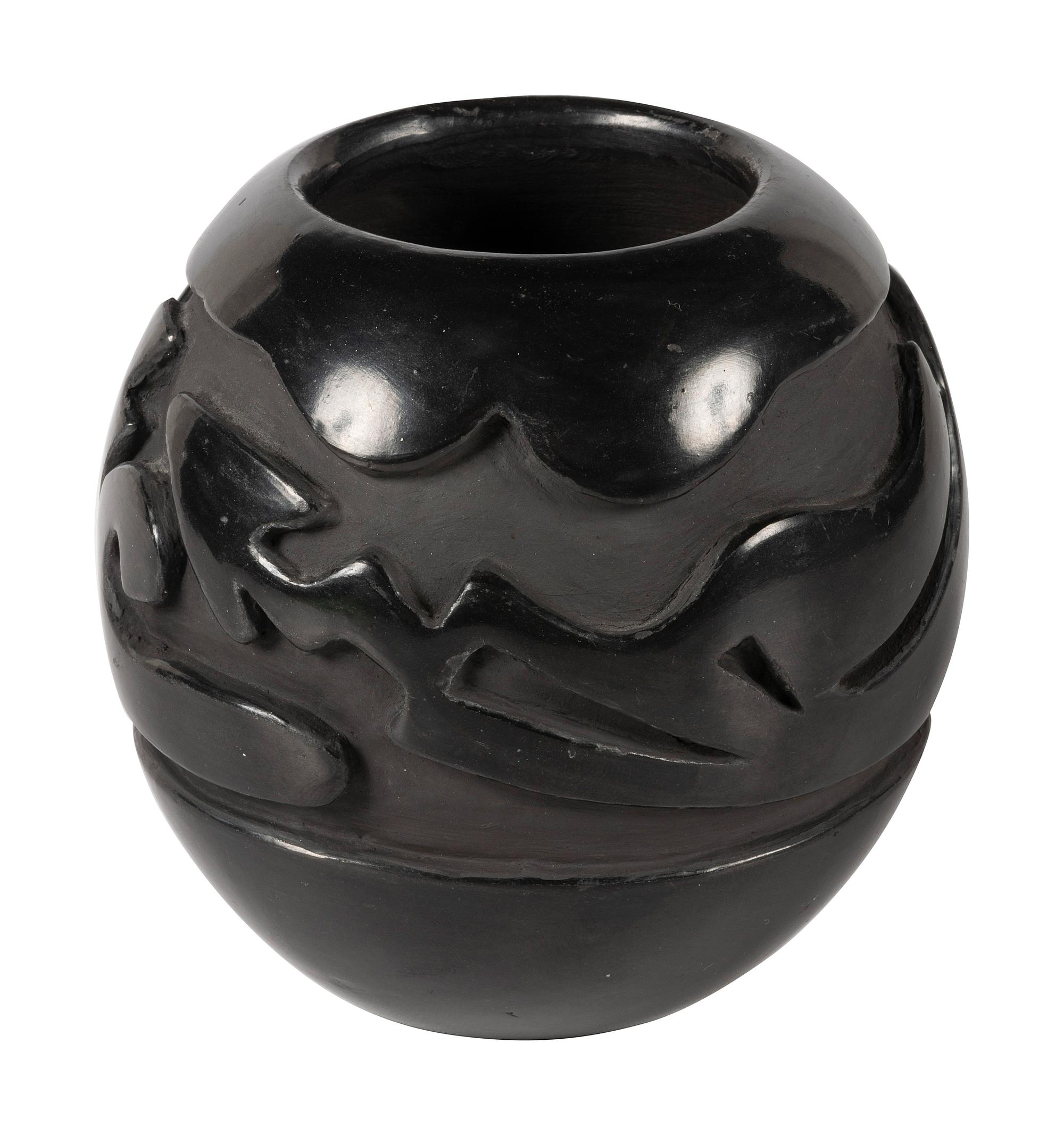 Deeply Carved Blackware Pottery Jar, with Avanyu