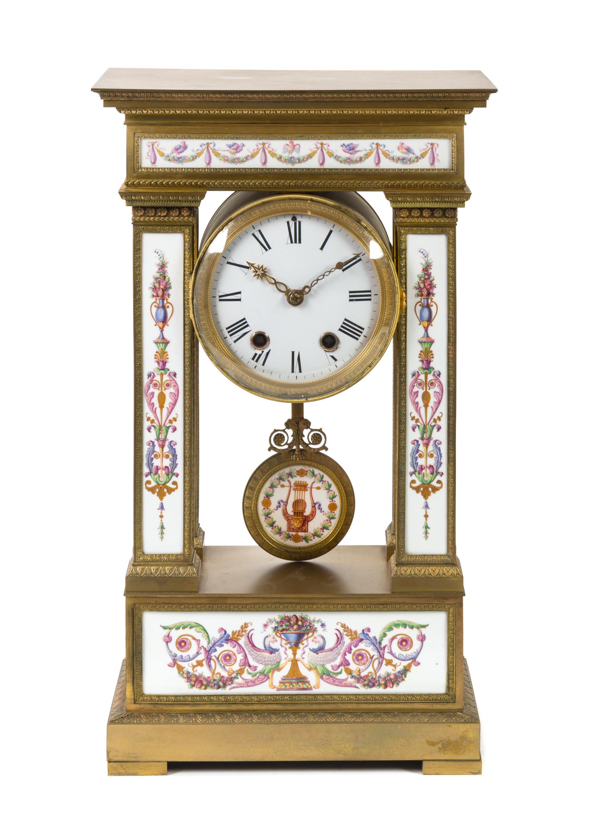 A Louis XVI Style Porcelain Inset Gilt Bronze Mantel Clock Height 21 1/2 inches. — 20TH CENTURY
