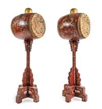 A Pair of Chinese Parchel Gilt and Red Lacquered Wood Drums on Stands Height 73 inches. — LATE 18TH/EARLY 19TH CENTURY