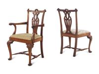 A Set of Seven George III Walnut Dining Chairs
