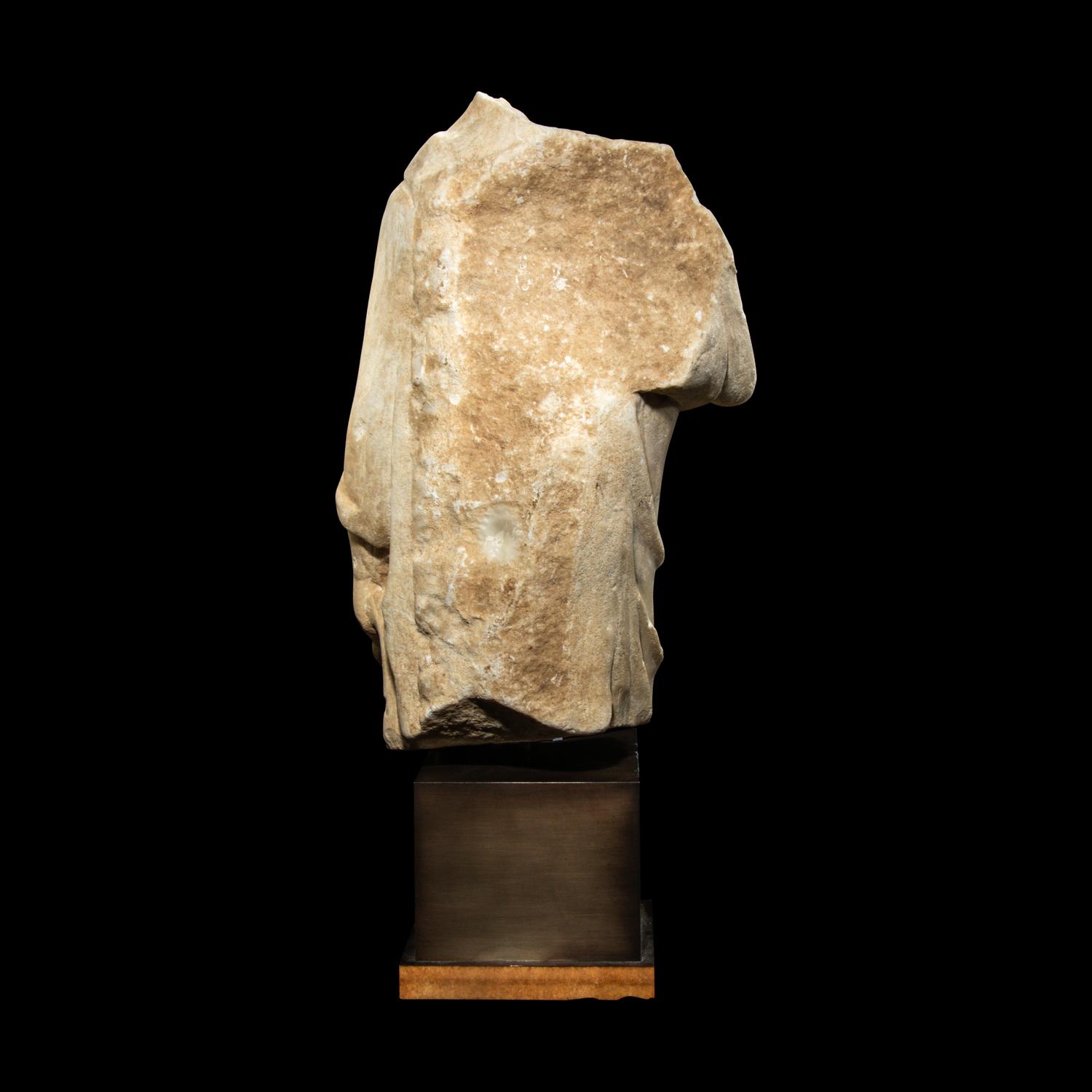 A Late Roman or Byzantine Marble Togatus Holding a Mappa