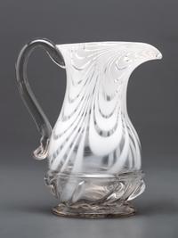 A New Jersey Blown-Glass Pitcher in Clear with White Swirls