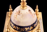 A Royal Vienna Porcelain Mounted Gilt Bronze Clock, Couaillet