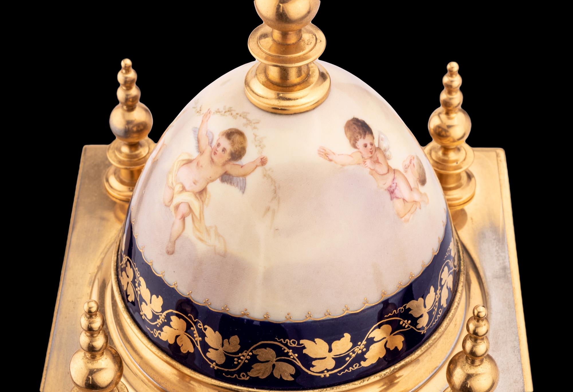 A Royal Vienna Porcelain Mounted Gilt Bronze Clock, Couaillet