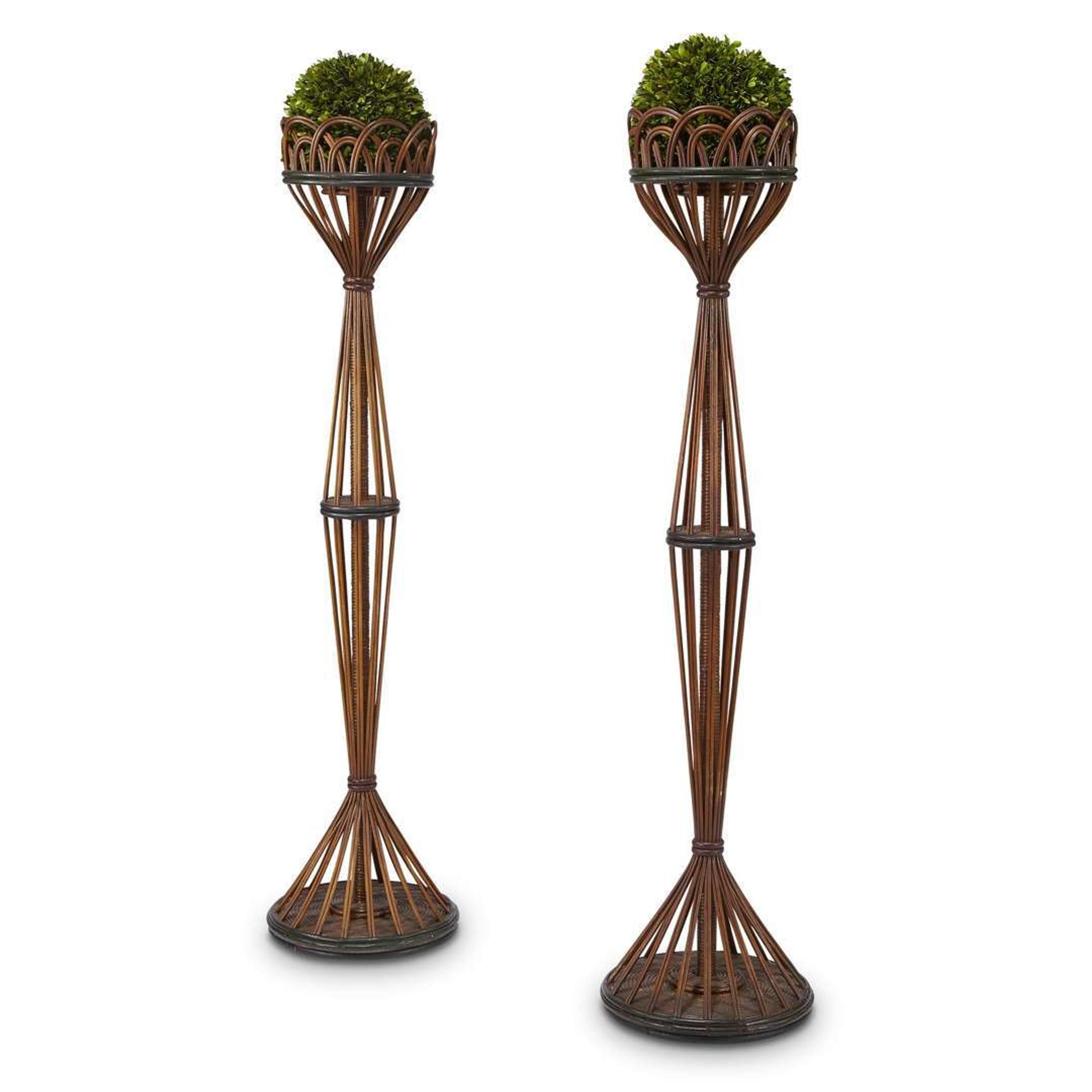 A pair of tall polychrome painted rattan plant stands american, circa 1920