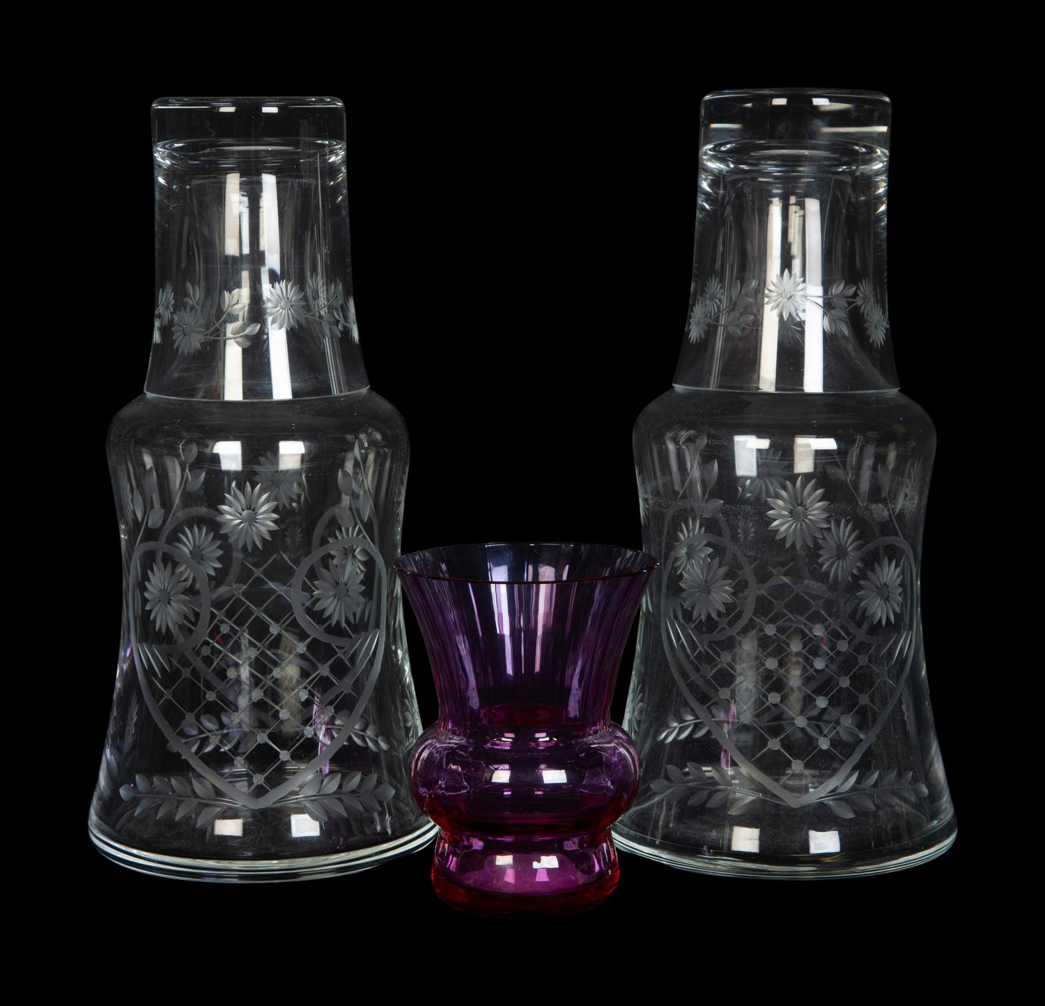 A Pair of Etched Glass Bedside Carafes and a Baccarat Bud Vase