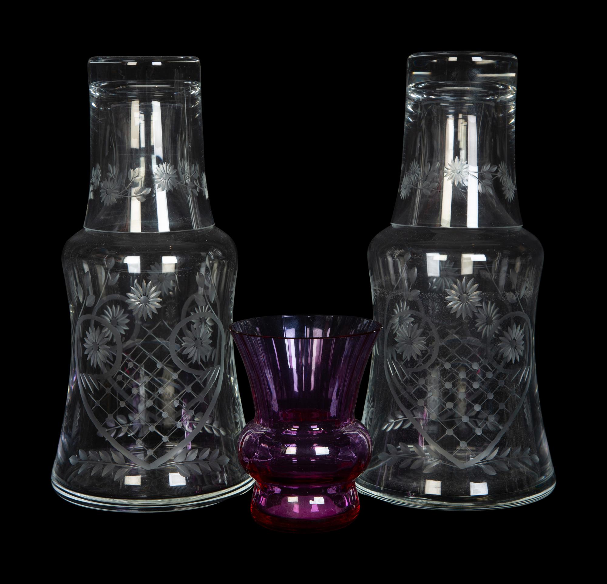 A Pair of Etched Glass Bedside Carafes and a Baccarat Bud Vase