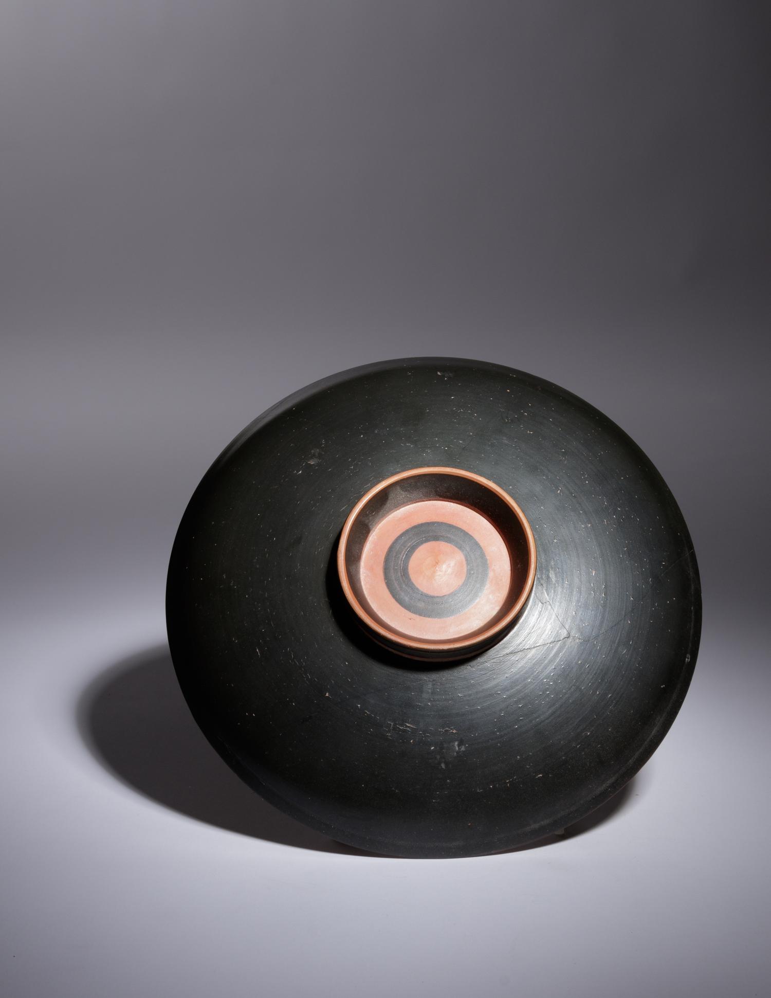 An Apulian Red-Figured Plate with Eros