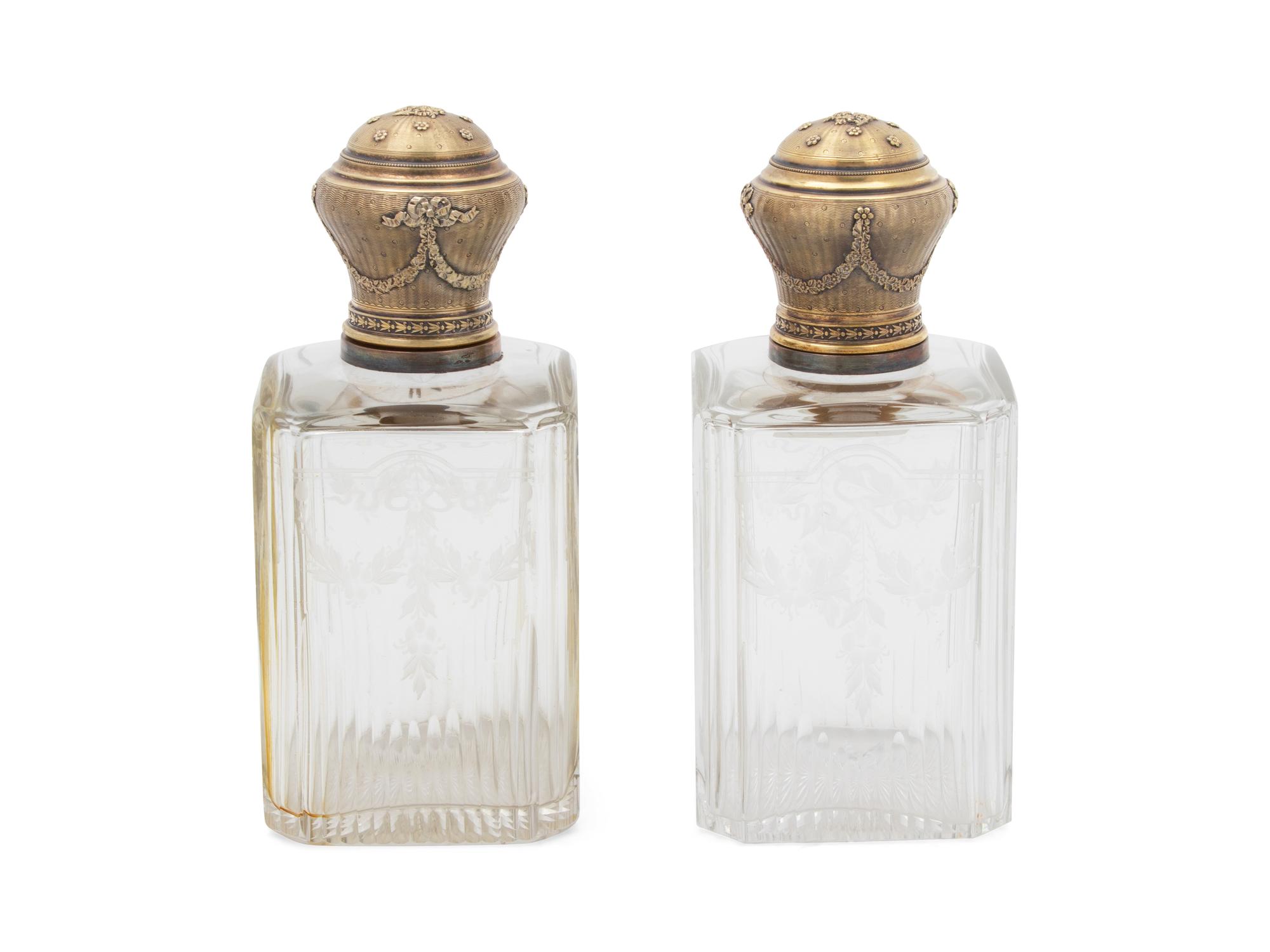 A Pair of French Etched Glass and Vermeil Topped Decanters