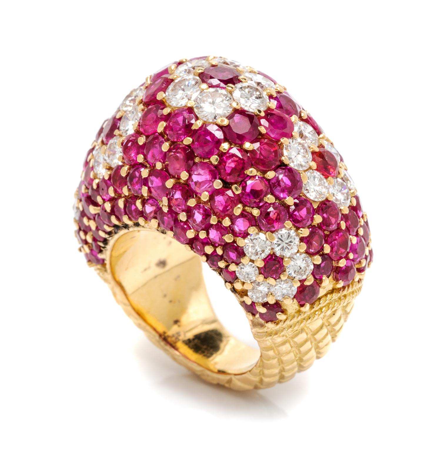 An 18 Karat Yellow Gold, Ruby and Diamond Bombe Ring, 13.60 dwts.
