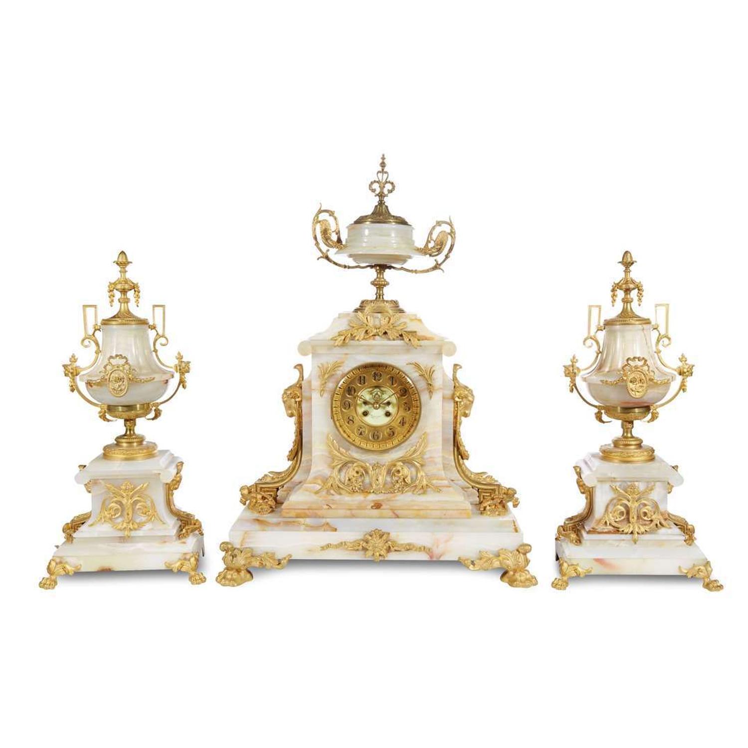 Fine three-piece marble and ormolu clock garniture Retailed by A.B. Griswold & Co., New Orleans, LA, late 19th century
