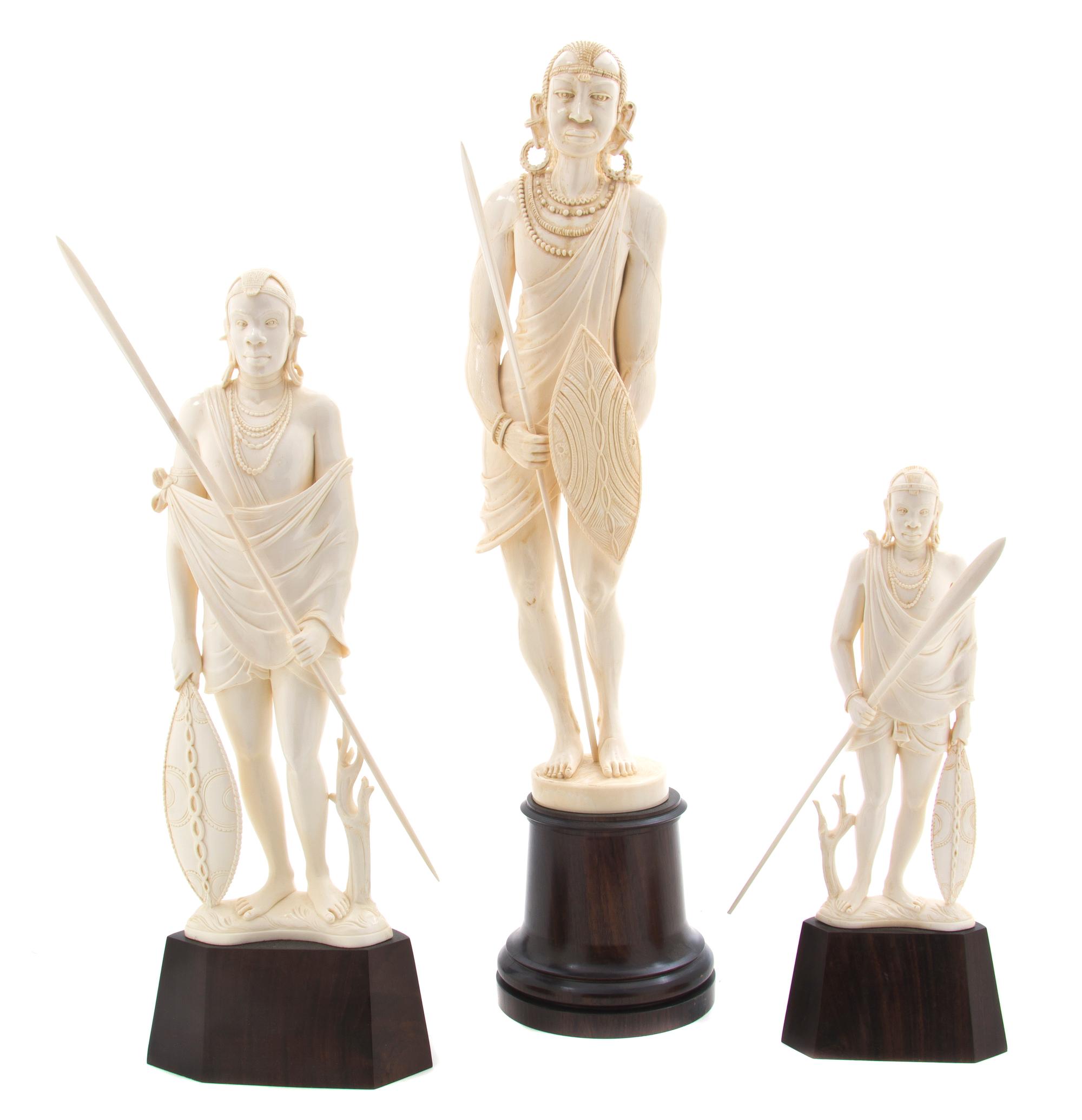 Three African Carved Ivory Figures, Height of tallest 14 1/2 inches.
