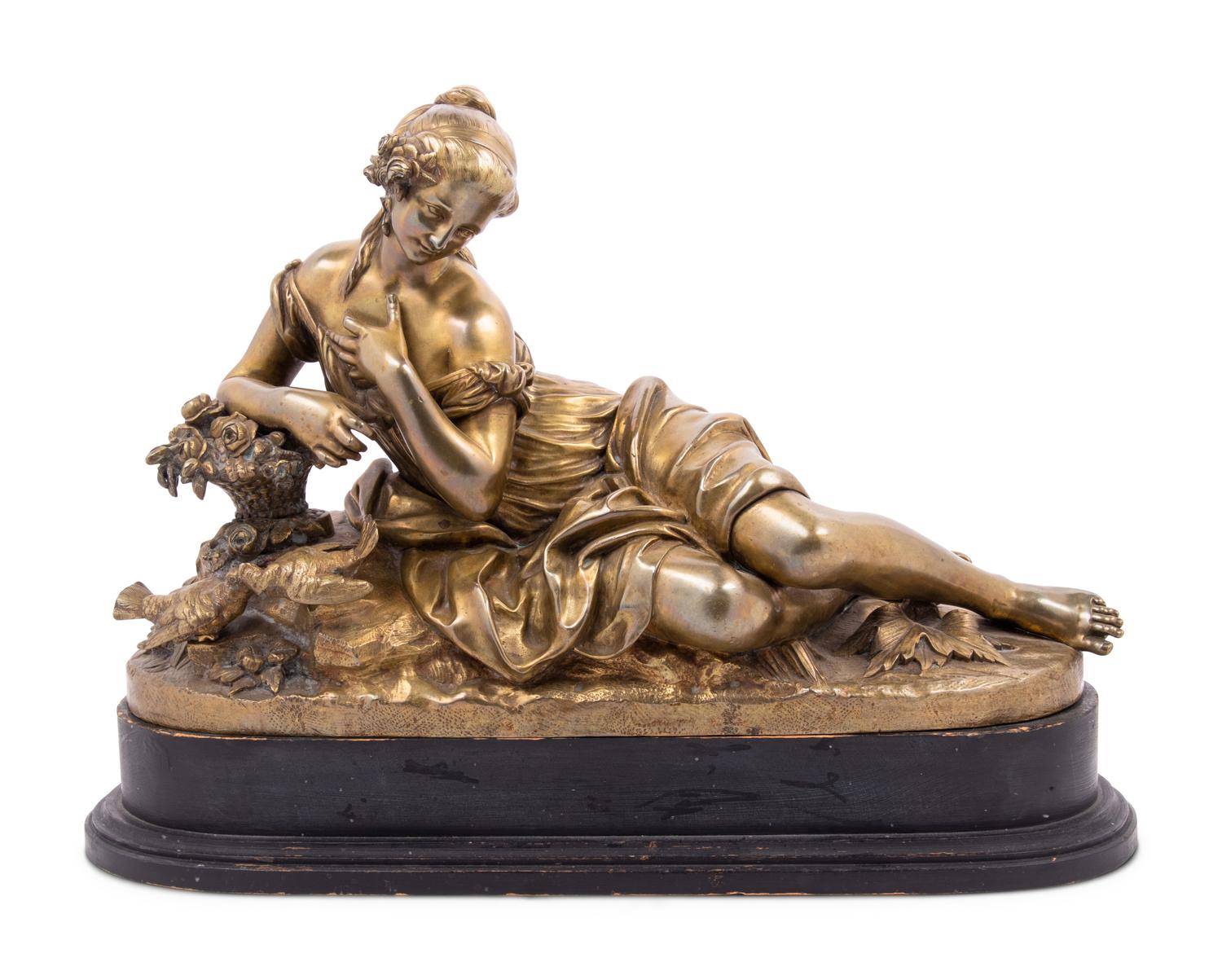 A Gilt Bronze Figure of a Reclining Woman