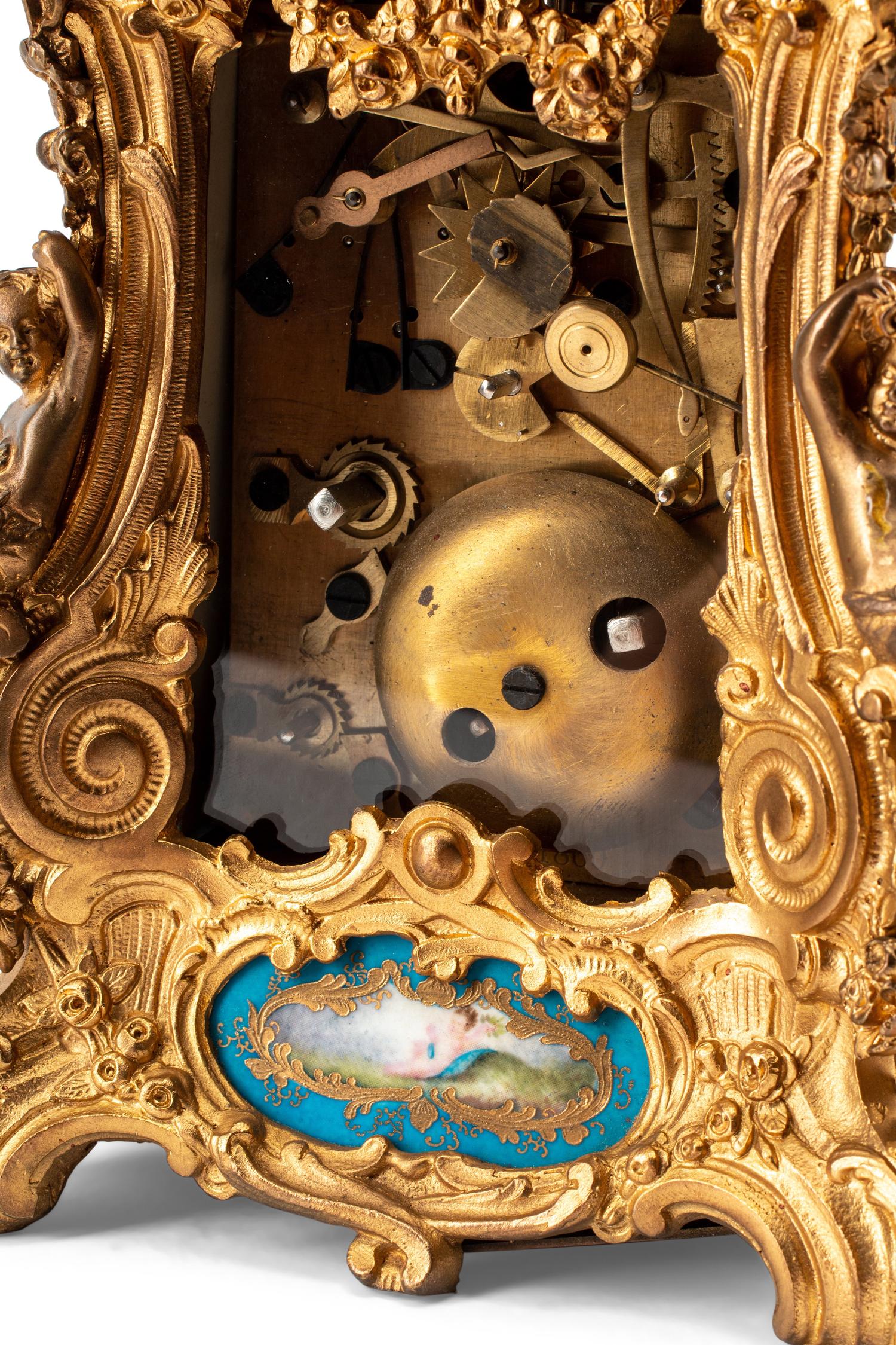 A Gilt Bronze and Sèvres Style Porcelain Carriage Clock