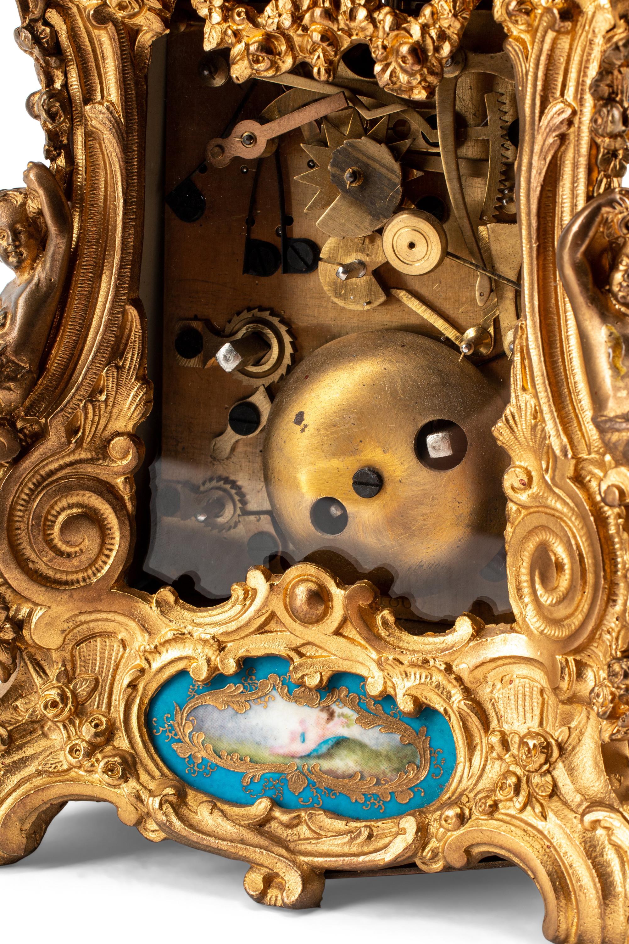 A Gilt Bronze and Sèvres Style Porcelain Carriage Clock
