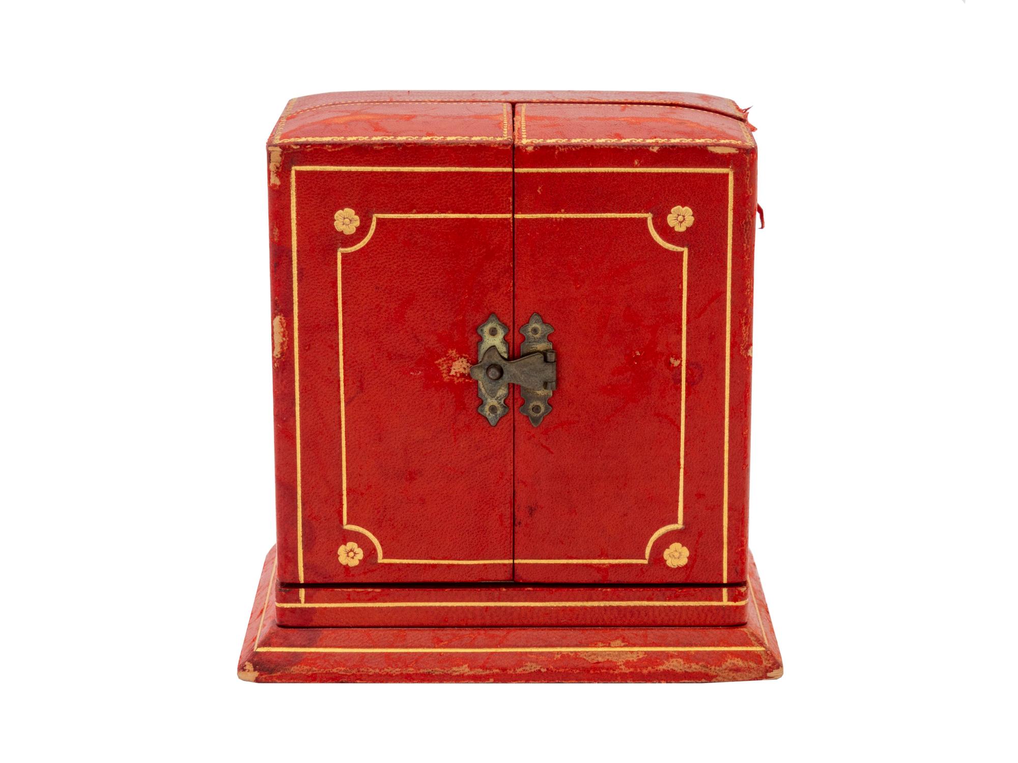 A Cartier Art Deco 18K Traveling Desk Clock — CIRCA 1940's