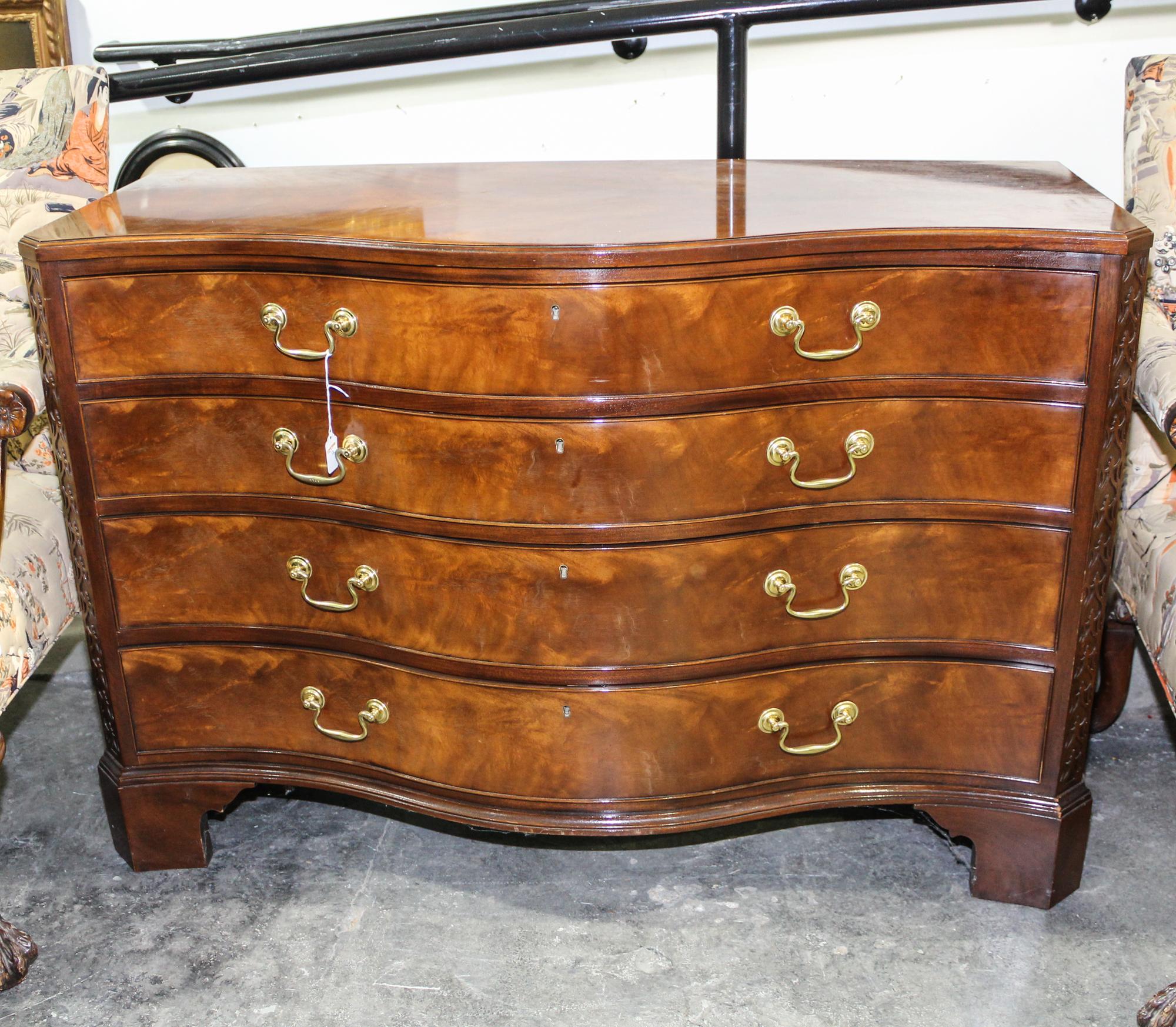 A Mahogany Chest of Drawers Height 32 1/2 x width 48 x depth 19 1/2 inches. — BAKER FURNITURE, 20TH CENTURY