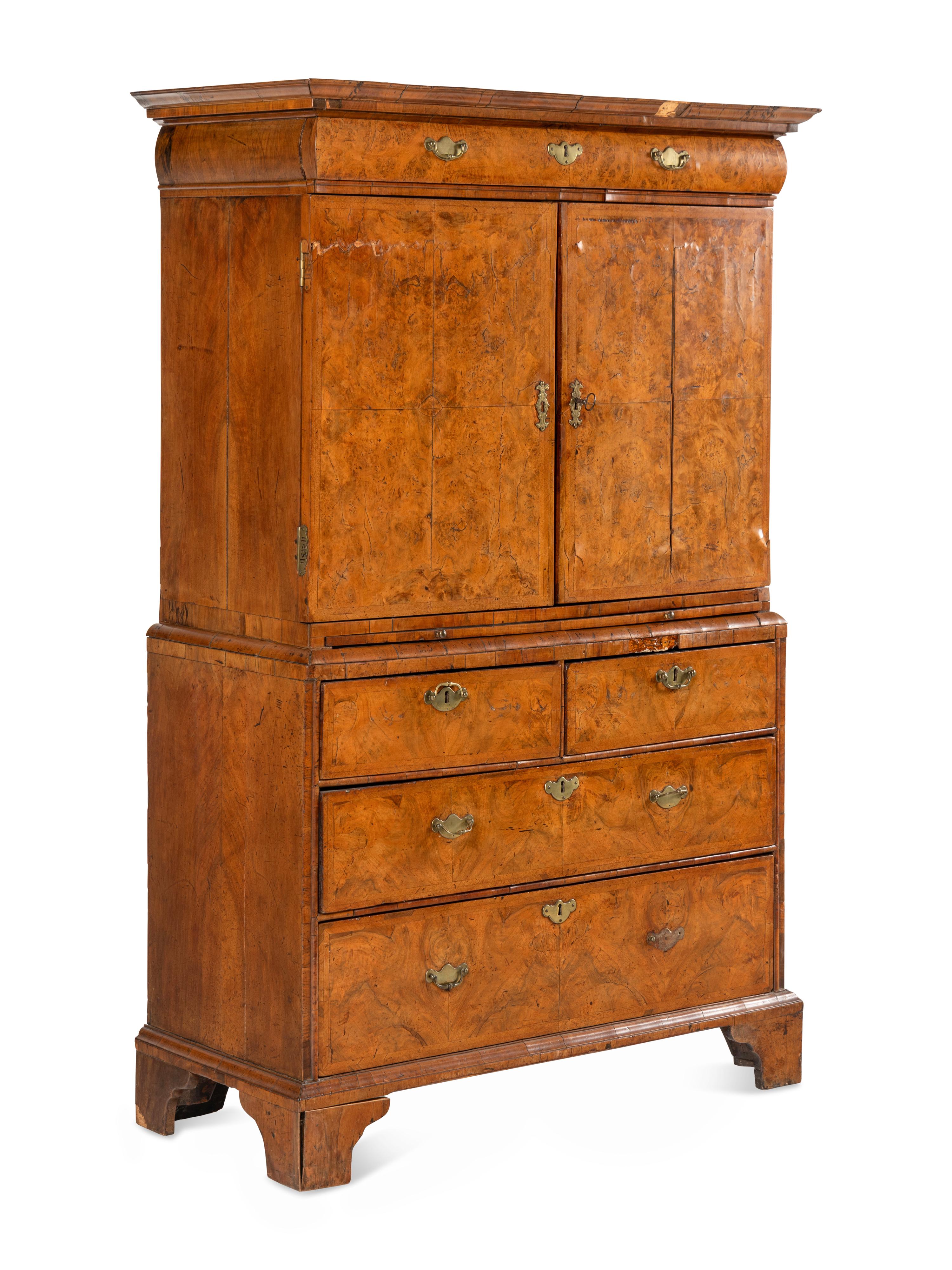 A Queen Anne Walnut Cabinet on Chest