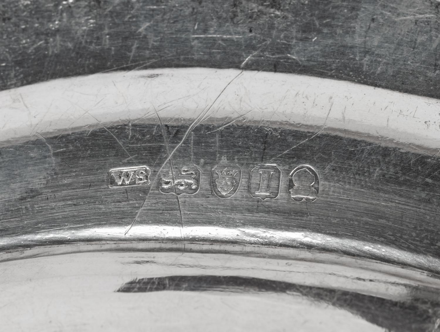 A Set of Twelve George III Silver Plates