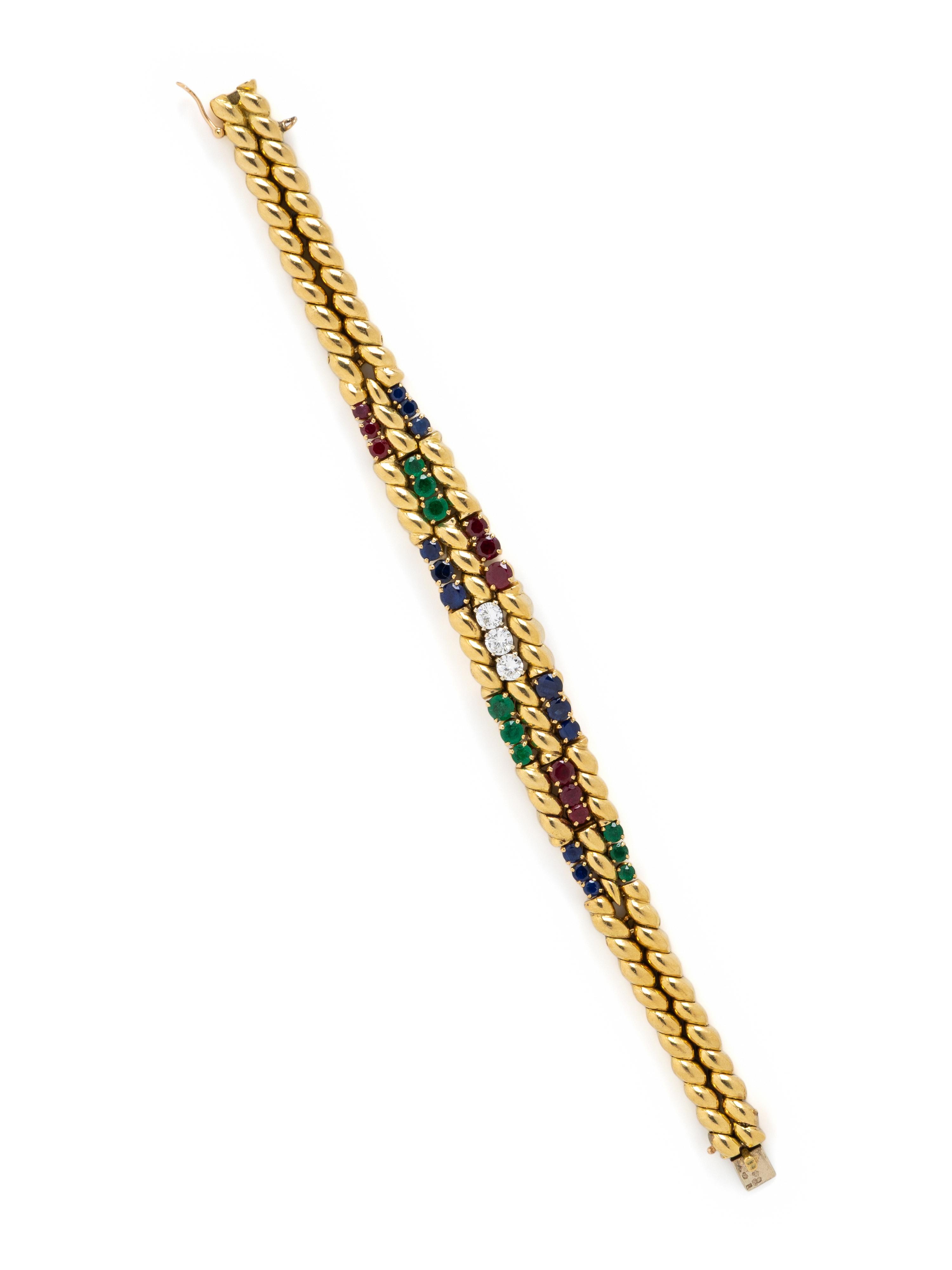 MAUBOUSSIN, FRENCH, YELLOW GOLD, EMERALD, DIAMOND, RUBY, AND SAPPHIRE BRACELET