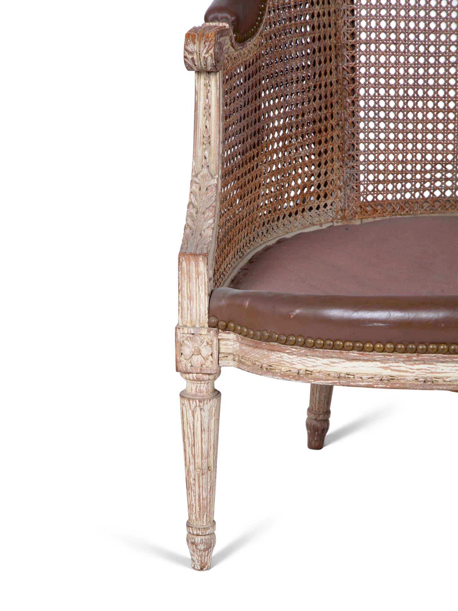 A Louis XVI Style Caned Bergere — LATE 19TH/EARLY 20TH CENTURY