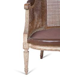 A Louis XVI Style Caned Bergere — LATE 19TH/EARLY 20TH CENTURY