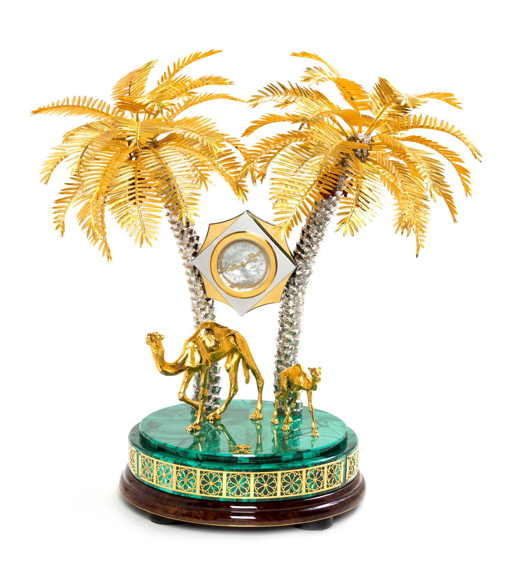 A Gilt Metal and Malachite Veneered Clock Height 18 1/2 inches. — MODERN