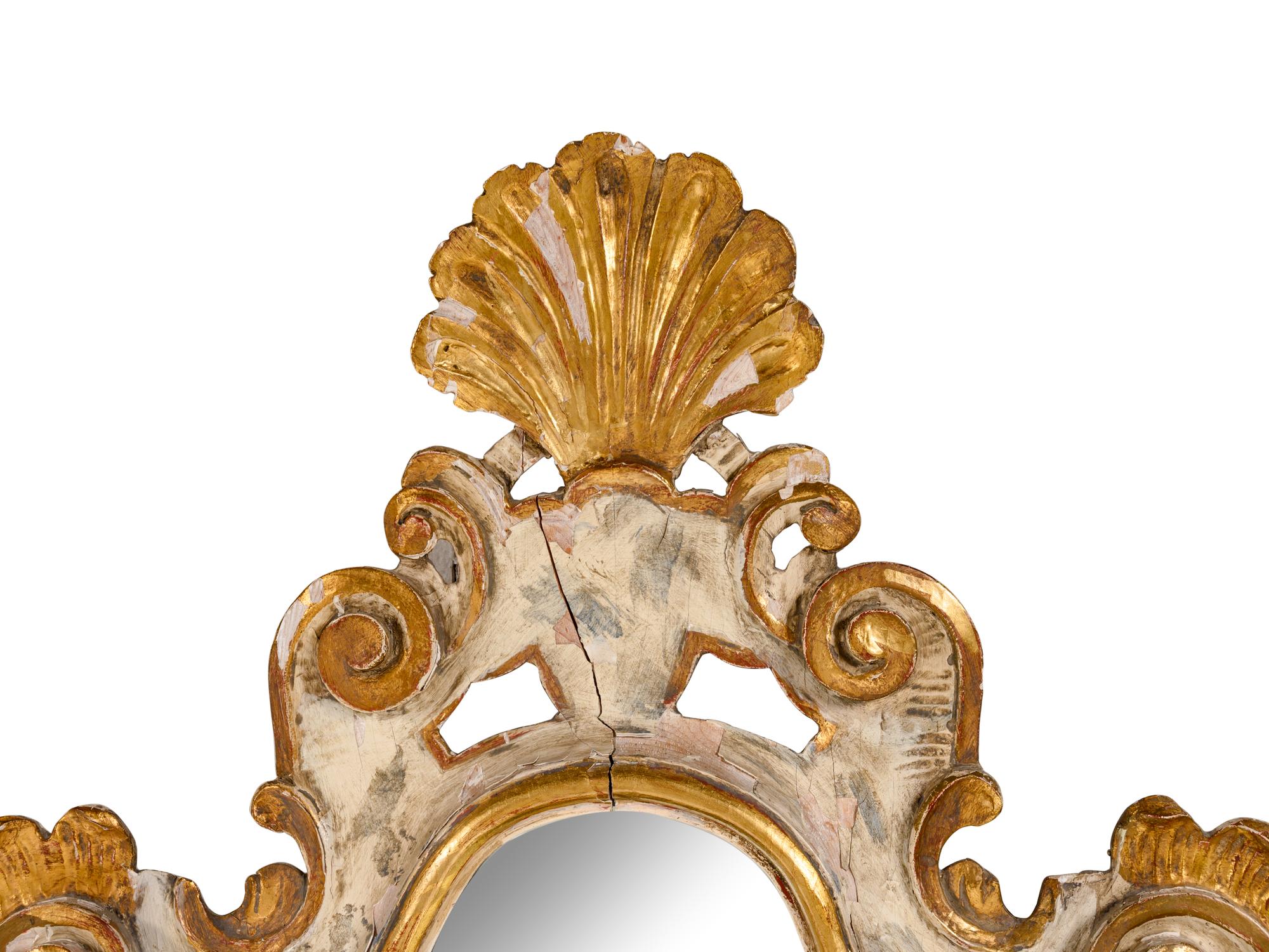 A Venetian Painted and Parcel Gilt Console Table and Mirror