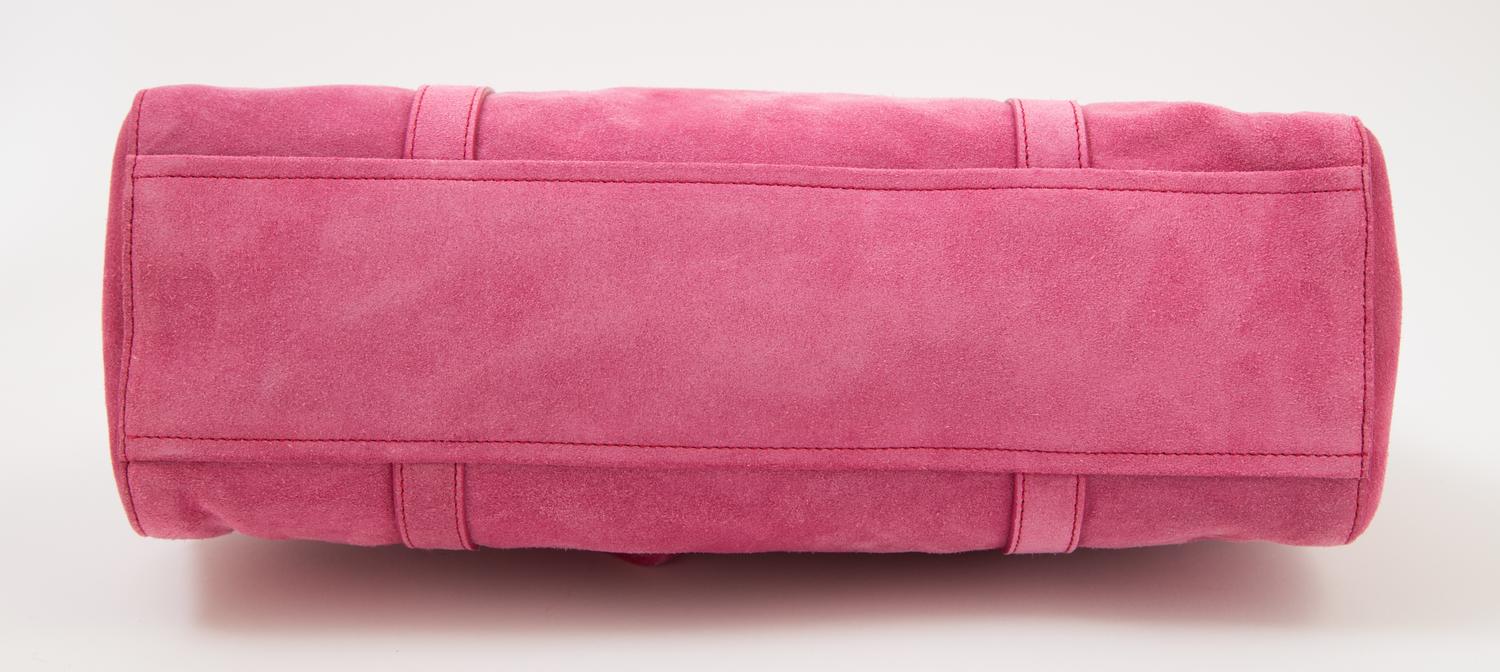 A Prada Pink Suede Handbag, 12.5" x 7.5" x 4.5"; Strap drop: 9".