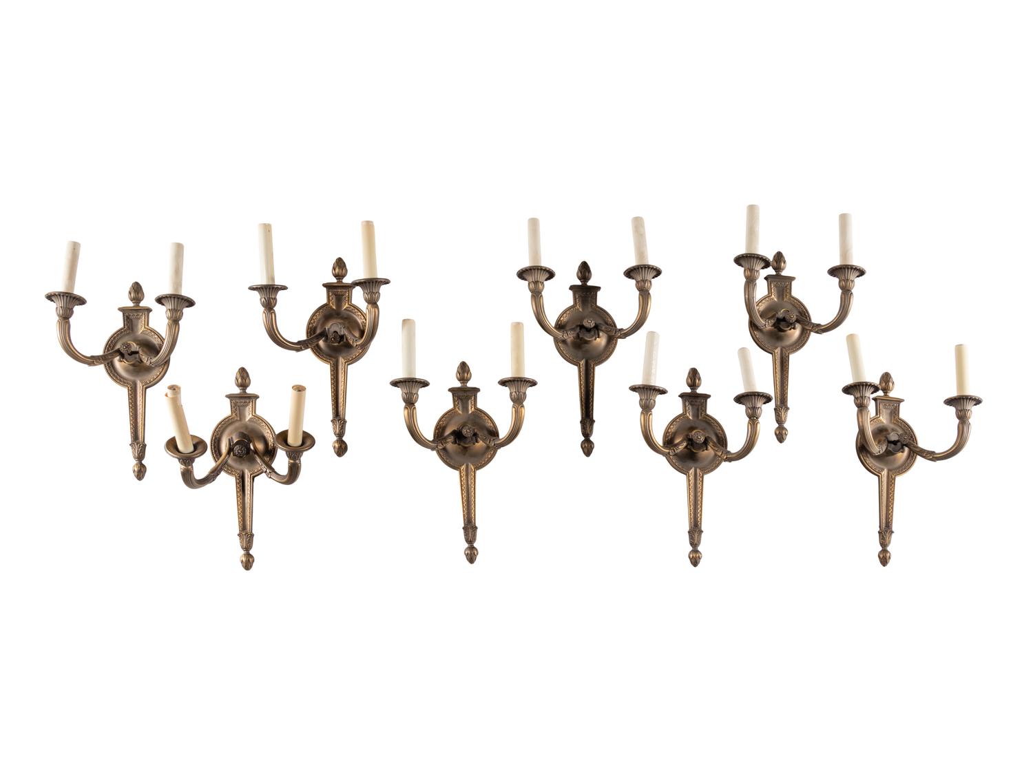 A Set of Eight Neoclassical Style Gilt Metal Two-Light Sconces