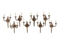 A Set of Eight Neoclassical Style Gilt Metal Two-Light Sconces