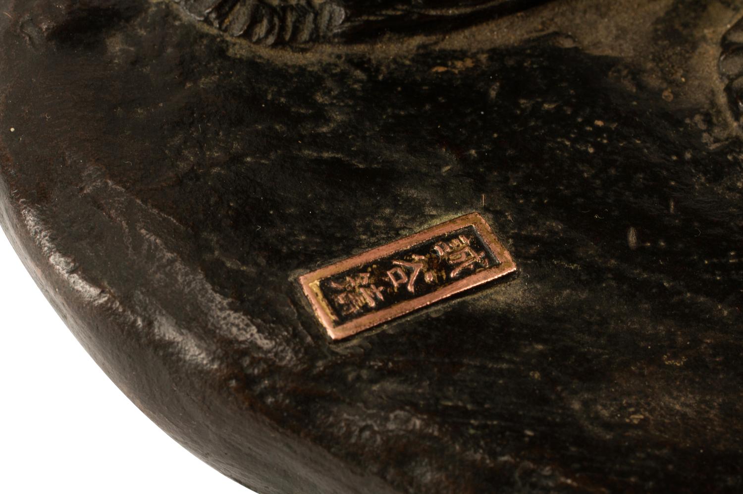 A Japanese Parcel Gilt Bronze Figure of a Lady
