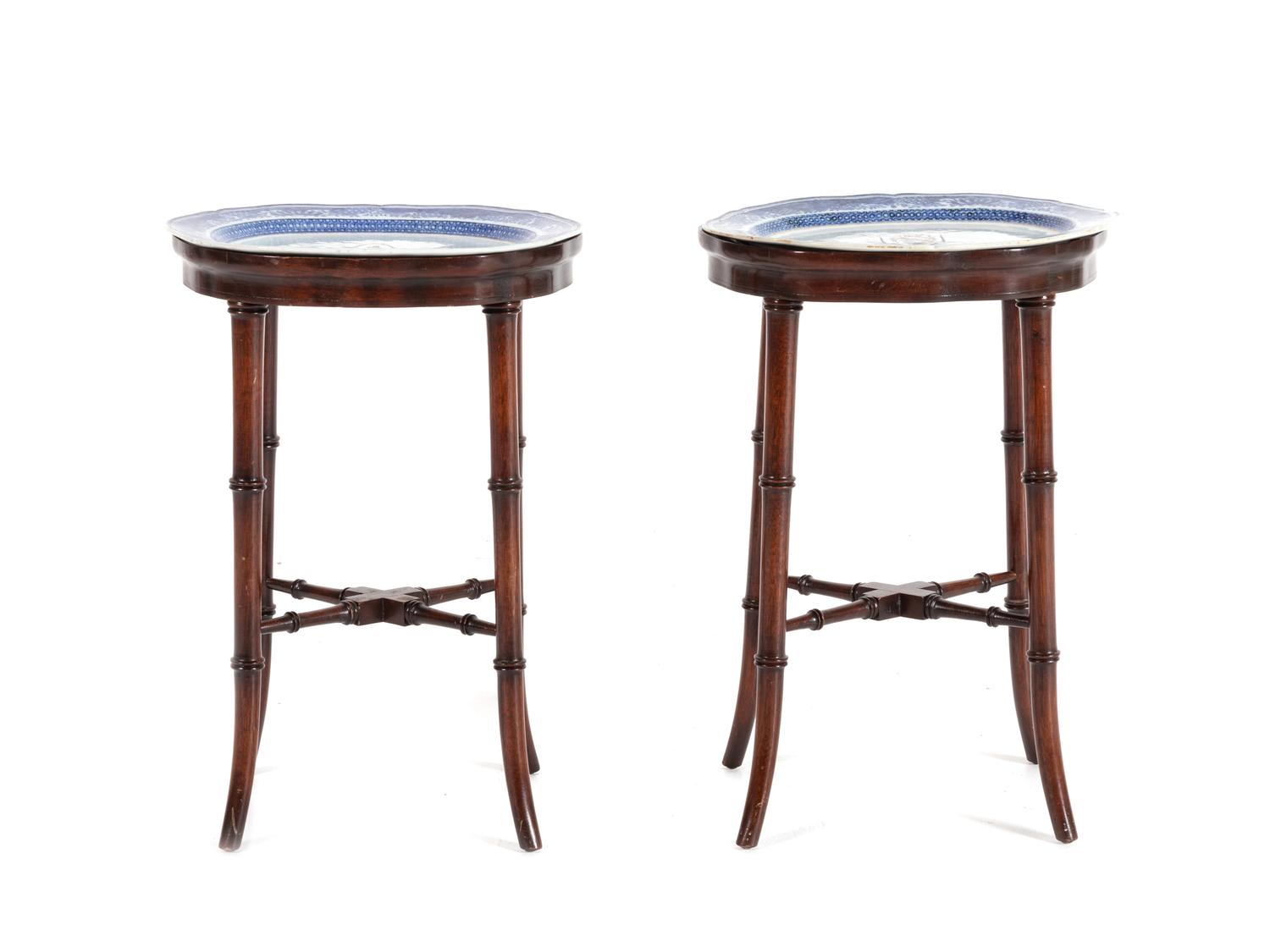 A Pair of Chinese Export Porcelain Armorial Platters Raised on Later Mahogany Stands