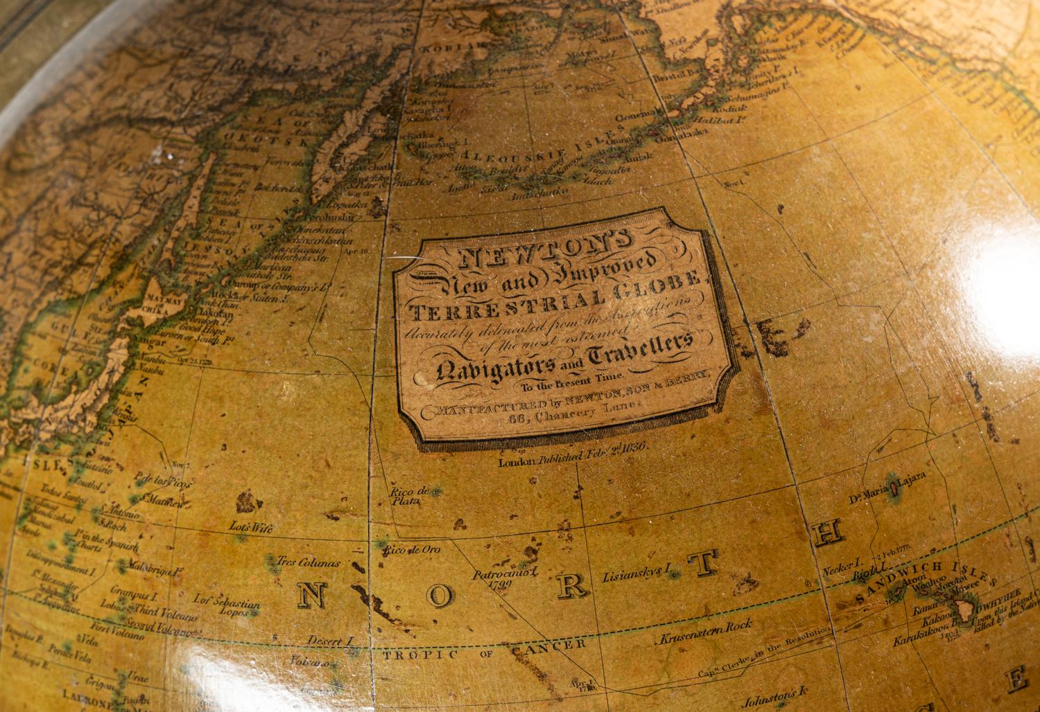 A Pair of Regency Mahogany Terrestrial and Celestial Fifteen-Inch Library Globes